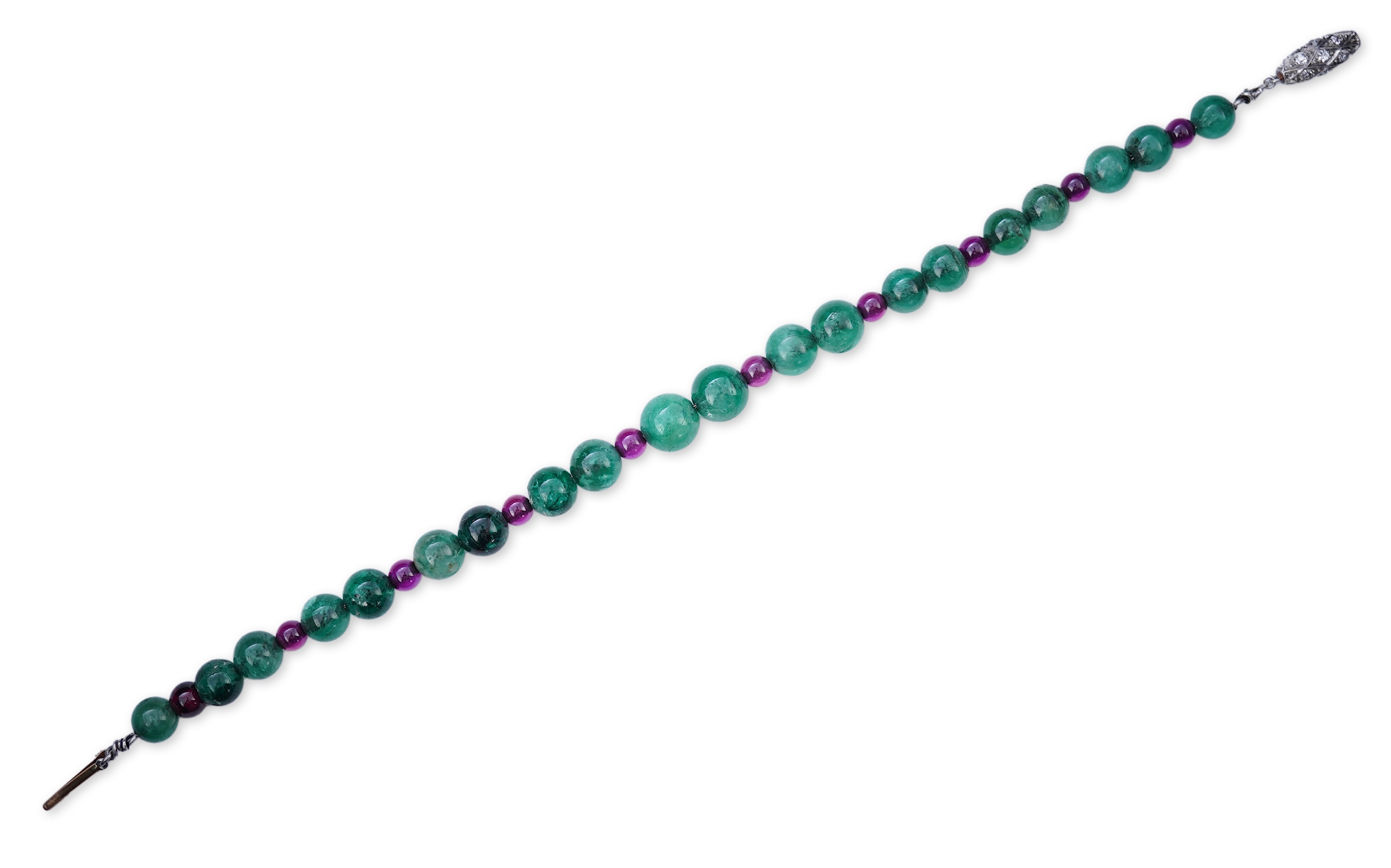 An Art Deco emerald, synthetic ruby and diamond bracelet, first half 20th century